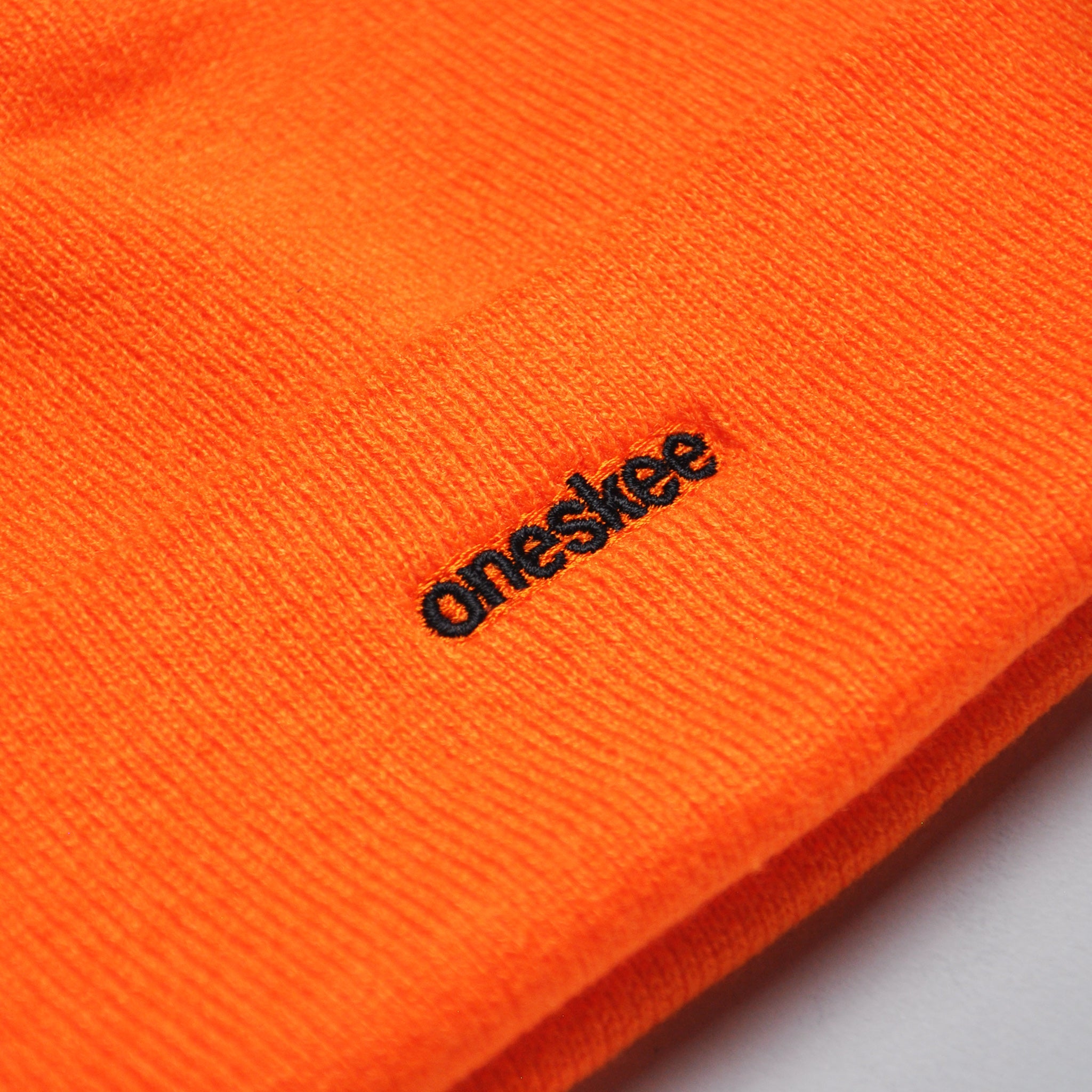 Essential Beanie, Orange - oneskee-ltd-us Logo